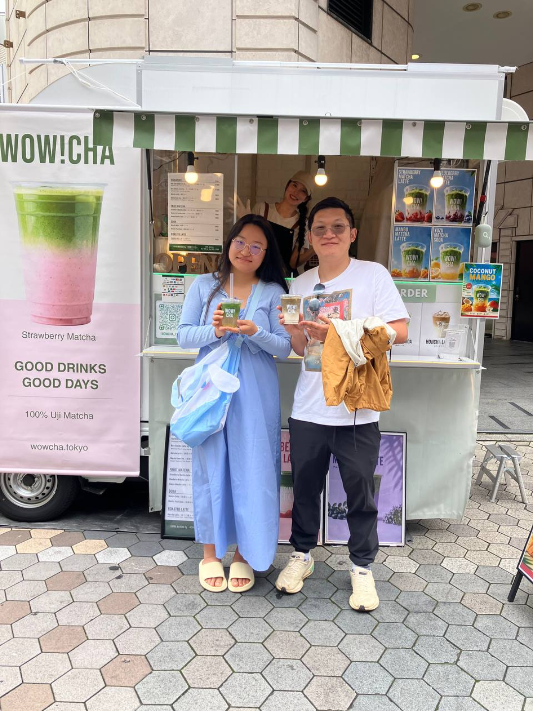 Friends holding matcha drinks at WOW!CHA Asakusa Rokku Broadway